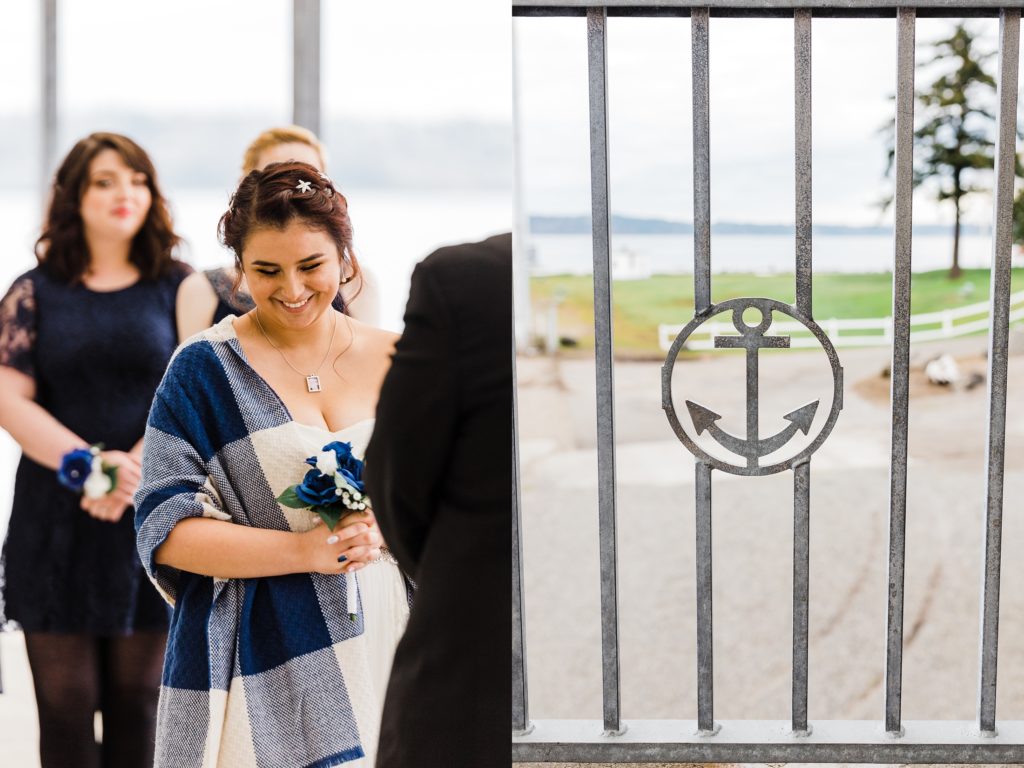 bride laughs over her shoulder during ceremony