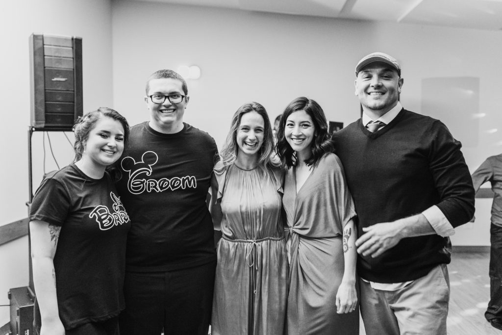 Jaclynn standing with two SJP couples as previous bride and groom are guests at the wedding